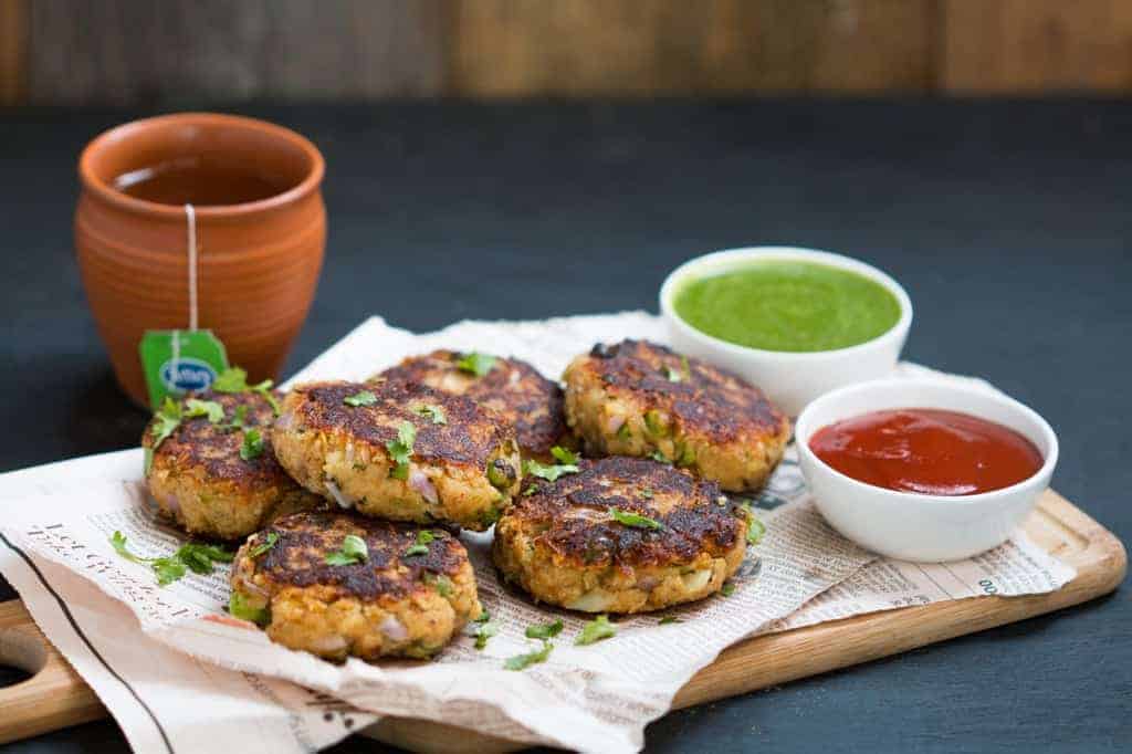Healthy north indian style peas potato and paneer tikkis are the perfect, easy appetizer for chilly evenings or when you have guests over!
