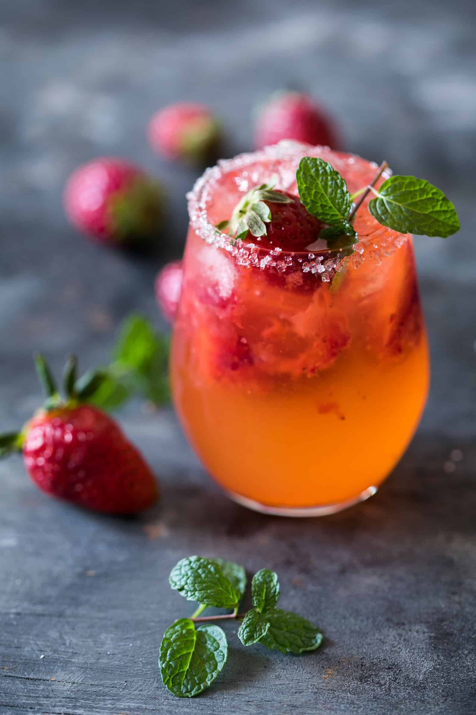 Mint Strawberry Moscow Mule is the perfect summer cocktail. Made with vodka and ginger beer it's super easy and our go to drink these days!