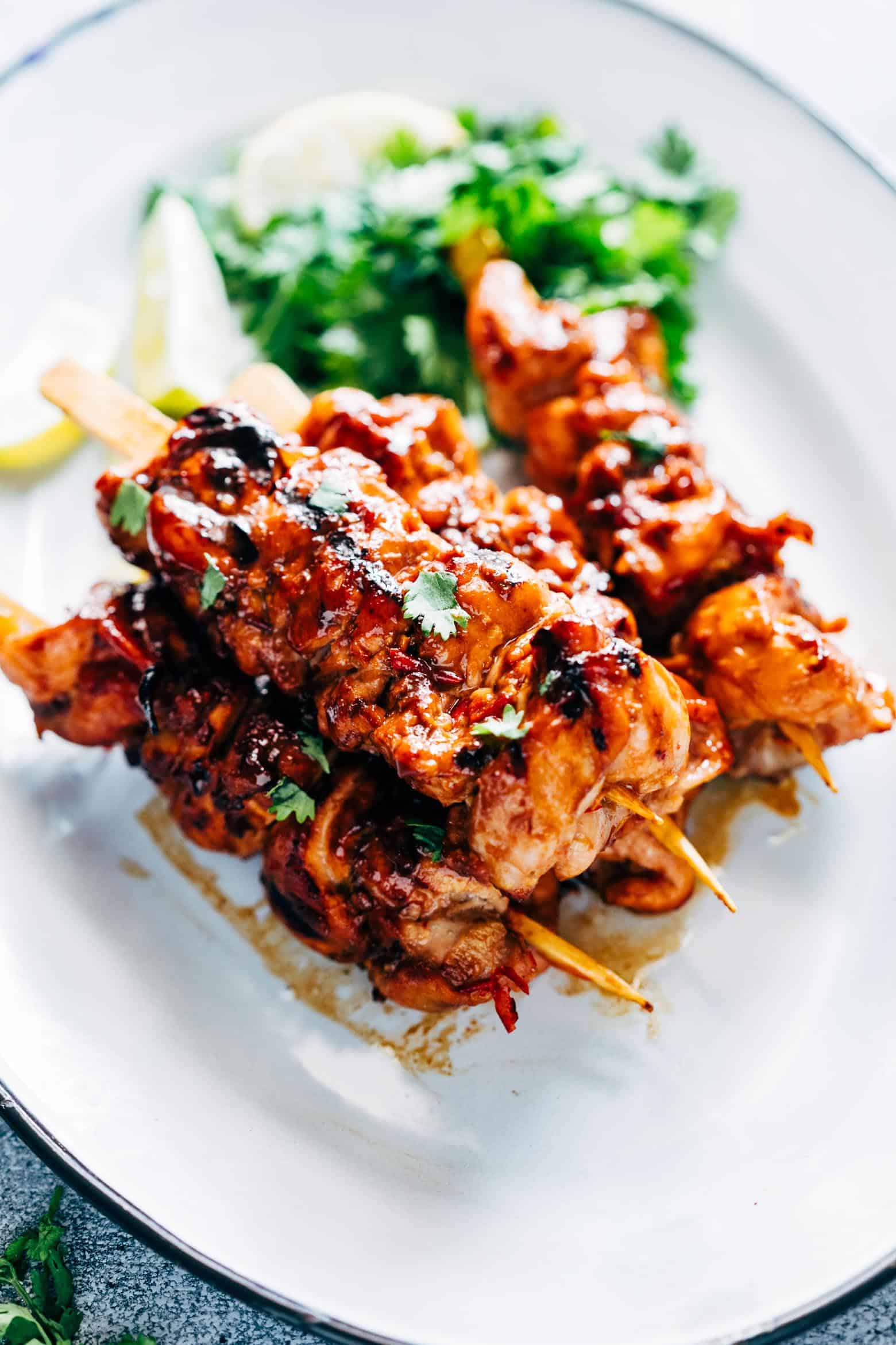Grilled Sambal Chicken Skewers is an easy, 5 ingredient recipe thats spicy, sweet and sticky! Its a chinese style recipe with sambal oelek, soy sauce and lemon grass.