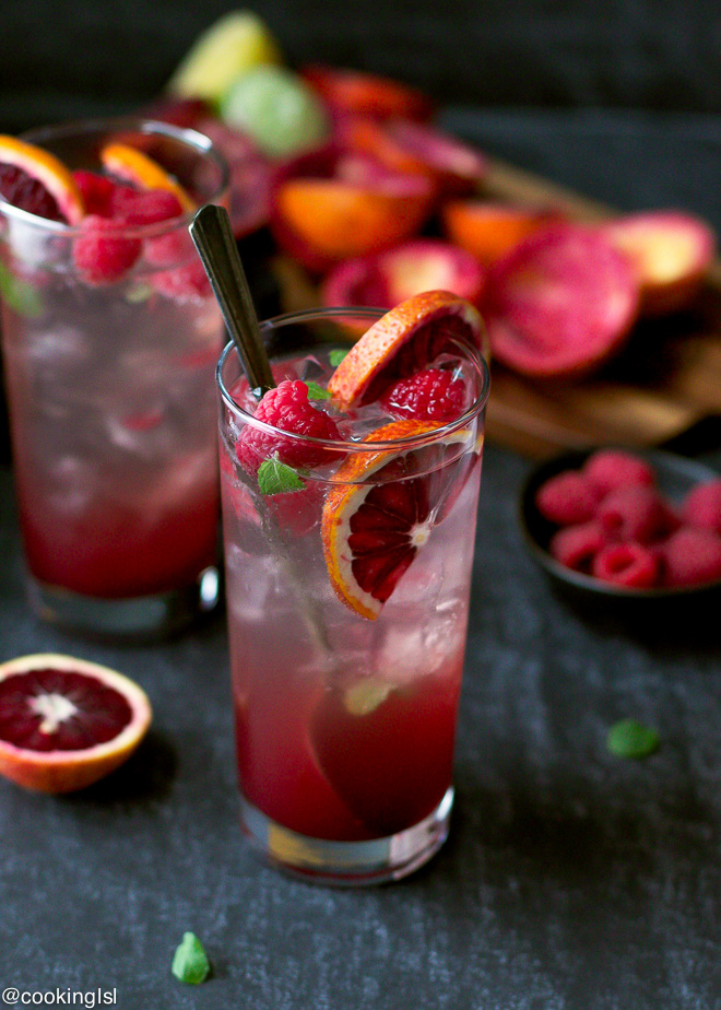 Mojitos are the perfect summer cocktails, and this one comes with blood oranges and raspberry making it tartly sweet and delicious!