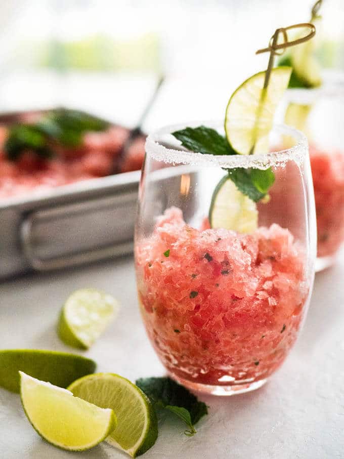 Watermelon mojito granita has fresh watermelon juice, white rum, lime and mint. A super freshing semi-frozen delight for a hot summer day!